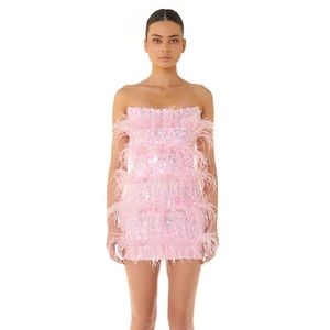 Embellished sequin with shaped neckline and figure hugging silhouette